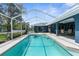 Beautiful screened pool with a spacious deck, perfect for enjoying the outdoors at 8084 Nightingale Rd, Weeki Wachee, FL 34613