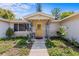 Welcome home to a well-maintained property with charming curb appeal and a covered entryway at 8634 Roble Way, Port Richey, FL 34668