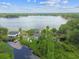Aerial shot showcasing a waterfront view of the property and the surrounding community at 8755 Marigold Dr, New Port Richey, FL 34654