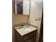 Bathroom with modern sink and lighting at 8755 Marigold Dr, New Port Richey, FL 34654