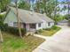 Charming single-story home with a spacious yard and a detached garage in a picturesque setting at 8755 Marigold Dr, New Port Richey, FL 34654