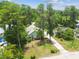 Lovely single-Gathering home with a spacious yard, surrounded by mature trees, providing ample shade at 8755 Marigold Dr, New Port Richey, FL 34654