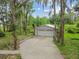 A two-car garage with an automatic door, providing ample parking and storage space at 8755 Marigold Dr, New Port Richey, FL 34654