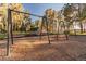 Swinging fun at the community playground for all to enjoy at 8755 Marigold Dr, New Port Richey, FL 34654