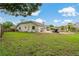 Large backyard with in-ground pool and nice landscaping at 8850 March Ct, New Port Richey, FL 34655