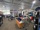 Bright golf shop with a variety of golf equipment, apparel, and accessories for sale at 9200 Turnberry Ct, New Port Richey, FL 34655