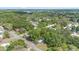 Birds eye view of wooded neighborhood with well kept properties at 9401 Bourbon St, New Port Richey, FL 34654