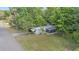 Charming single-story home surrounded by lush greenery on a spacious lot at 9401 Bourbon St, New Port Richey, FL 34654