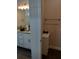 Half view of a granite countertop and double sink bathroom vanity at 9967 Patrician Dr, New Port Richey, FL 34655
