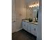 Bright bathroom with granite countertop and double sink vanity at 9967 Patrician Dr, New Port Richey, FL 34655