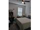 Comfortable bedroom with a serene atmosphere and natural light at 9967 Patrician Dr, New Port Richey, FL 34655