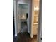 Interior showcasing stylish flooring leading to the bedroom and a bathroom at 9967 Patrician Dr, New Port Richey, FL 34655