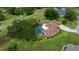 An aerial shot shows the home's pool and a winding path at 10044 Twelve Oaks Ct, Weeki Wachee, FL 34613