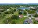 An aerial view of the community, with a lake and winding paths at 10044 Twelve Oaks Ct, Weeki Wachee, FL 34613