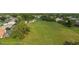 Expansive golf course view with lush green fairways and surrounding residential homes, showcasing community amenities at 10044 Twelve Oaks Ct, Weeki Wachee, FL 34613
