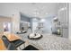 Kitchen area with granite countertops, bar seating, and modern appliances at 10044 Twelve Oaks Ct, Weeki Wachee, FL 34613
