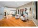 Sitting area featuring hardwood floors, comfortable chairs, and a view of the outdoors at 10044 Twelve Oaks Ct, Weeki Wachee, FL 34613