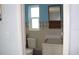 A simple bathroom with a toilet and a window, offering a clean and bright space at 101 Sheryl Lynn Dr, Brandon, FL 33510