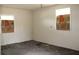 Bedroom with carpet flooring and natural light blocked by cardboard at 101 Sheryl Lynn Dr, Brandon, FL 33510