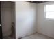 A simple bedroom with a closet and a window, offering a clean and bright space at 101 Sheryl Lynn Dr, Brandon, FL 33510