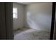 A simple bedroom with a closet and a window, offering a clean and bright space at 101 Sheryl Lynn Dr, Brandon, FL 33510