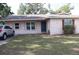 Charming single-story home featuring a well-maintained front yard and a welcoming entrance at 101 Sheryl Lynn Dr, Brandon, FL 33510