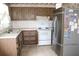 Kitchen with stainless steel refrigerator and white appliances at 101 Sheryl Lynn Dr, Brandon, FL 33510