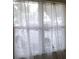 Window with sheer curtains providing natural light at 101 Sheryl Lynn Dr, Brandon, FL 33510