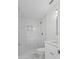 Clean bathroom features marble tiled shower, modern sink, and toilet at 1024 Spindle Palm Way, Apollo Beach, FL 33572