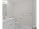 Clean bathroom with modern sink, toilet, and towel bar at 1024 Spindle Palm Way, Apollo Beach, FL 33572