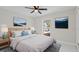 Comfortable bedroom with a plush bed, stylish decor, and ample natural light at 1024 Spindle Palm Way, Apollo Beach, FL 33572