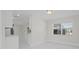 Cozy dining area with natural light, and a view to the kitchen and rear yard at 1024 Spindle Palm Way, Apollo Beach, FL 33572