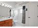 Stylish bathroom with a sink, vanity, and shower-tub combo for added convenience at 10250 Locker Dr, Spring Hill, FL 34608