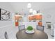 Dining area with view into the kitchen and living room at 10250 Locker Dr, Spring Hill, FL 34608