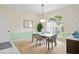 Dining room with floral wallpaper and view from window at 10250 Locker Dr, Spring Hill, FL 34608
