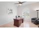 Bright office space with a large desk, comfortable chair, and ample natural light at 10250 Locker Dr, Spring Hill, FL 34608