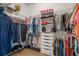 Organized walk-in closet with ample storage, shelving, and hanging space for clothes at 10250 Locker Dr, Spring Hill, FL 34608