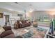 Spacious living room flows into the kitchen, offering open living and lots of light at 1033 Ashbourne Cir, Trinity, FL 34655