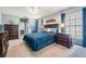 Beautiful main bedroom with an en-suite bathroom and dark wood furniture at 1033 Ashbourne Cir, Trinity, FL 34655