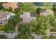 Overhead image of the home, highlighting the pool area, roof, and the privacy offered by mature landscaping at 10531 Pontofino Cir, Trinity, FL 34655