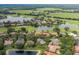 Beautiful aerial view of golf course community showing the layout of golf course, ponds, and surrounding homes at 10531 Pontofino Cir, Trinity, FL 34655