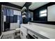 Bathroom featuring a neutral vanity and shower with blue and white curtains at 10670 43Rd N St # 204, Clearwater, FL 33762