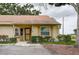Charming single-story home with guest parking, mature trees and well-maintained landscaping at 10670 43Rd N St # 204, Clearwater, FL 33762