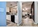 Open-concept living space flowing from the kitchen and featuring hardwood floors at 10670 43Rd N St # 204, Clearwater, FL 33762