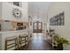 Foyer showcasing double doors, tile flooring, and an open view to the kitchen at 11404 Inman Ct, Spring Hill, FL 34609