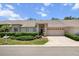 Charming single-story home with a well-maintained lawn and a two-car garage in a quiet neighborhood at 1142 Wolford Dr, Trinity, FL 34655
