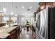 Well-appointed kitchen with stainless steel appliances, granite countertops, and breakfast nook at 1142 Wolford Dr, Trinity, FL 34655