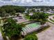 Aerial view featuring shuffleboard courts, parking, and surrounding residential areas at 11733 Bayonet Ln, New Port Richey, FL 34654