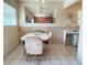 The dining area is filled with natural light and offers a cozy space for Gathering meals or gatherings at 11733 Bayonet Ln, New Port Richey, FL 34654