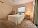 Serene bedroom features soft colors, ample closet space, and a calming ambiance perfect for restful nights at 11733 Bayonet Ln, New Port Richey, FL 34654